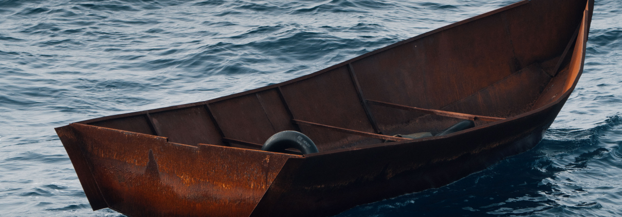 Empty boat at the sea