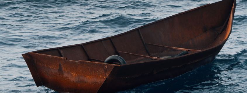 Empty boat at the sea